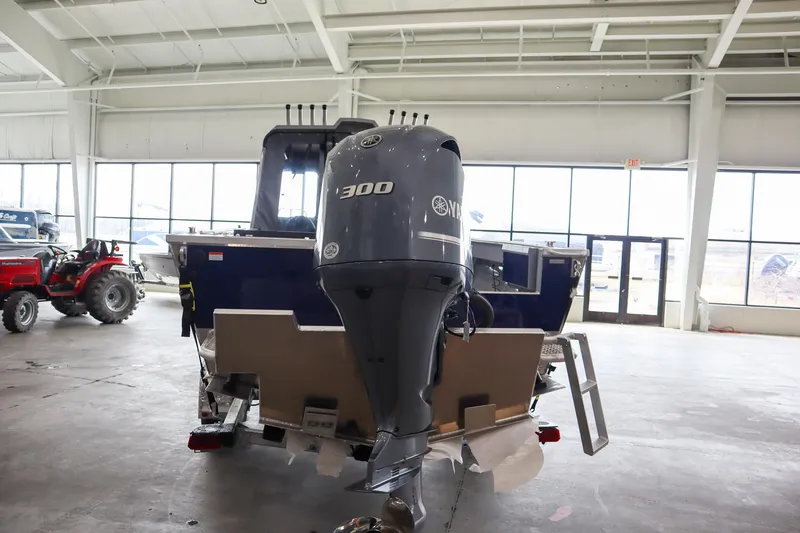 Slide: The Image of 2025 Hewescraft 240 Ocean Pro ET HT boat with powerful 300 HP outboard motor. - 5