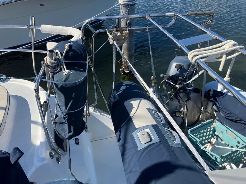 Slide: The Image of Sailboat deck with blue covers and railing, Hunter Passage 450, 2001 model. - 33