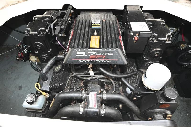 Slide: The Image of Engine of 1998 Sea Ray 240 Sundancer with 5.7L EFI digital ignition system. - 26