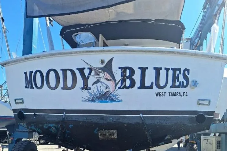 Slide: The Image of 1979 Bertram 35 Sport Fisherman boat named "Moody Blues" in West Tampa, FL. - 4