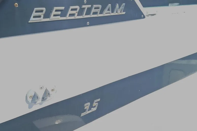Slide: The Image of 1979 Bertram 35 Sport Fisherman boat, close-up of logo and model number. - 6