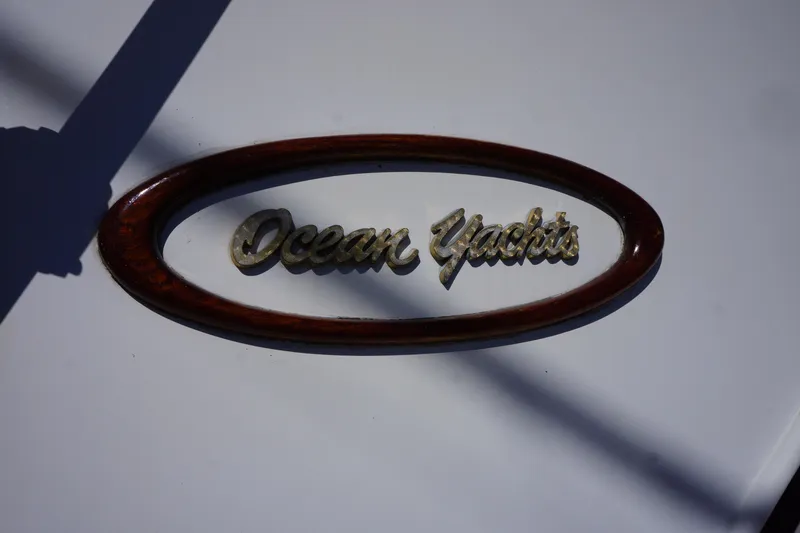 Slide: The Image of 1988 Ocean Yachts Super Sport logo on a white surface. - 31