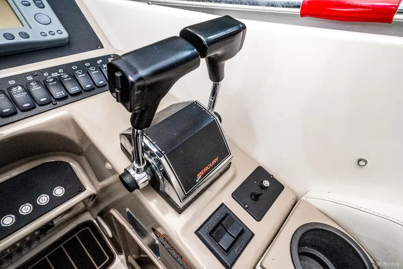 Slide: The Image of Close-up of 2001 Bayliner 3055 Ciera boat controls and dashboard. - 20