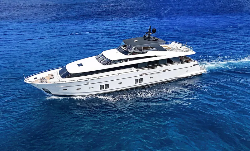 Slide: The Image of Sanlorenzo SL104 2014 yacht cruising on clear blue ocean waters. - 1