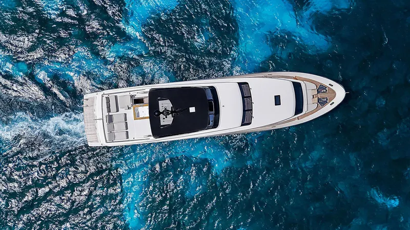 Slide: The Image of Aerial view of 2014 Sanlorenzo SL104 yacht cruising in vibrant blue waters. - 10