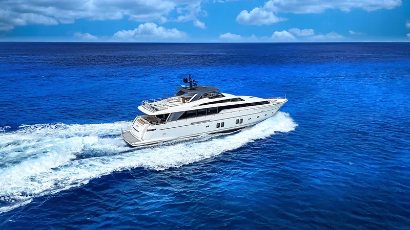 Slide: The Image of Sanlorenzo SL104 yacht cruising on open sea, 2014 model, under clear blue skies. - 11