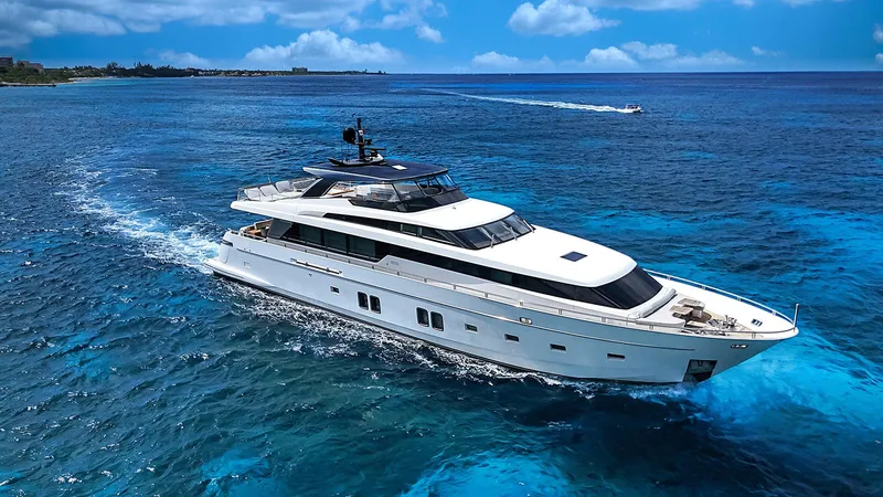 Slide: The Image of Sanlorenzo SL104 2014 yacht cruising on clear blue ocean waters. - 13