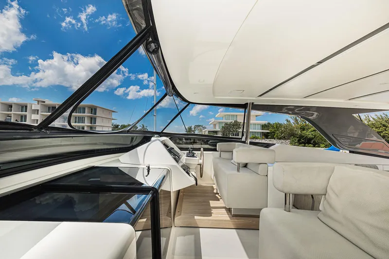 Slide: The Image of Sanlorenzo SL104 2014 yacht interior with modern seating and panoramic windows. - 15