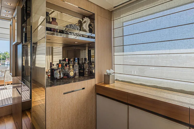 Slide: The Image of Luxurious interior of 2014 Sanlorenzo SL104 yacht with elegant bar area and window view. - 28