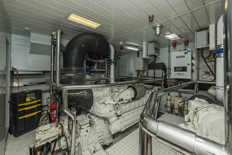 Slide: The Image of Engine room of 2014 Sanlorenzo SL104 yacht, featuring advanced machinery and equipment. - 37
