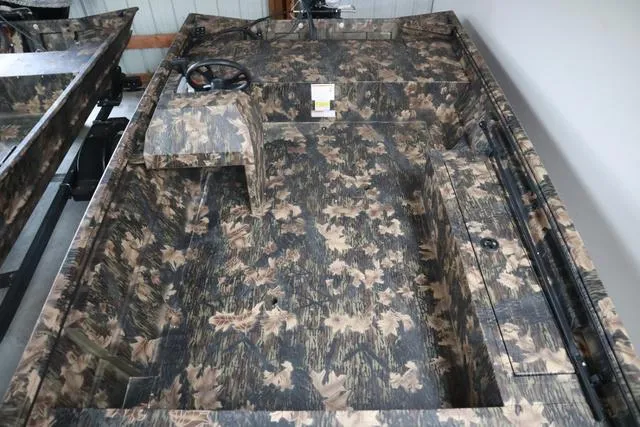 Slide: The Image of 2024 Lowe Roughneck 1760 boat with camo design and add-on console. - 8