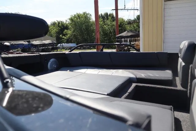 Slide: The Image of 2022 Lowe FS 1700 Fish & Ski boat interior with seating and storage. - 3