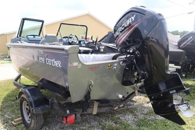 Slide: The Image of 2016 Lowe FM 1710 Pro WT fishing boat with Mercury outboard motor. - 8