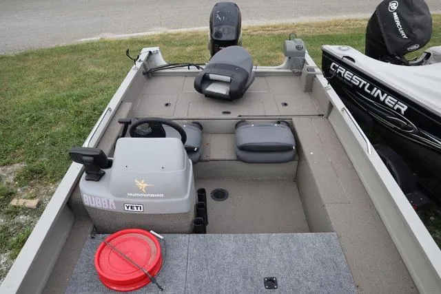Slide: The Image of 1998 Tracker Pro Angler V16 SC fishing boat interior with steering console and seating. - 5