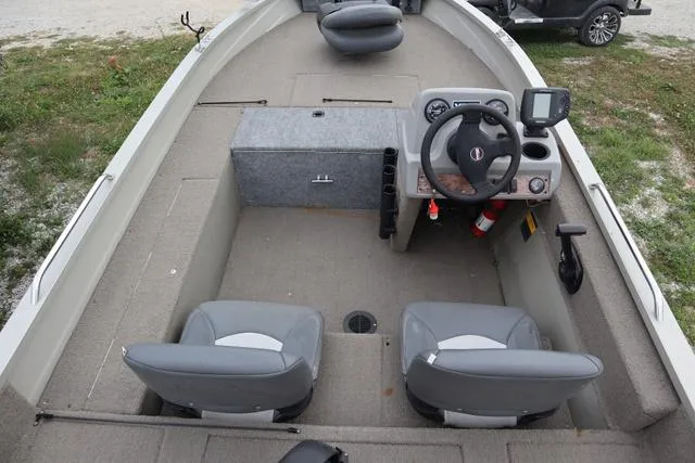 Slide: The Image of 1998 Tracker Pro Angler V16 SC boat interior with steering console and seating. - 7