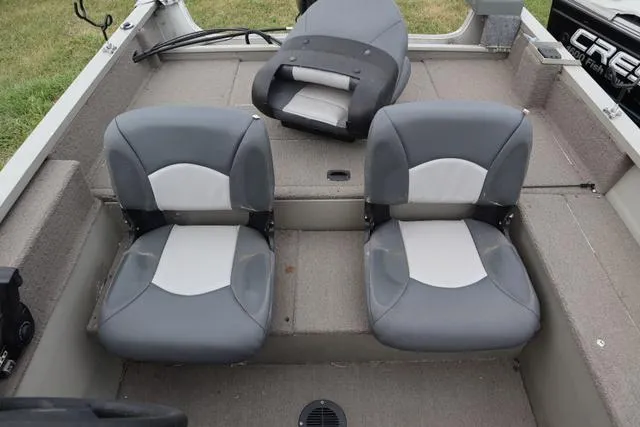 Slide: The Image of 1998 Tracker Pro Angler V16 SC boat interior with gray seating. - 8