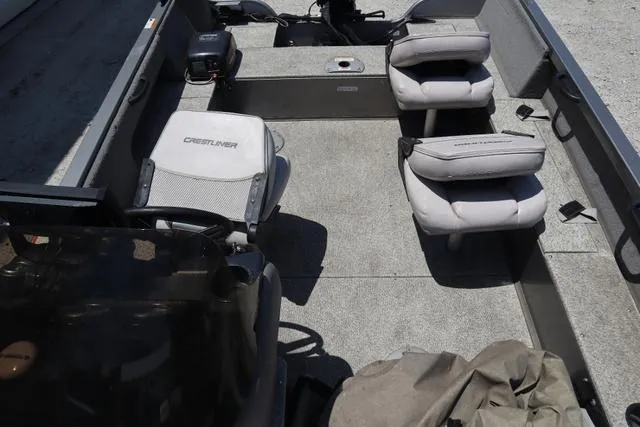 Slide: The Image of 2008 Crestliner 1600 Fish Hawk SC interior with seating and console. - 7