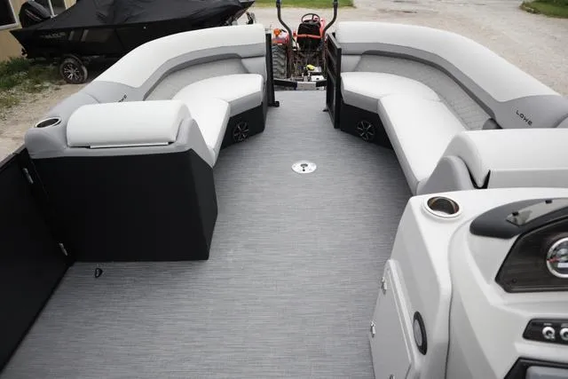 Slide: The Image of 2024 Lowe SS 230 DL Triple Tube Package interior with spacious seating and modern design. - 5
