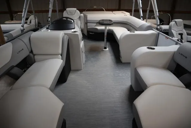 Slide: The Image of 2023 Lowe SS 210 Triple Tube Package interior with luxurious seating and modern design. - 3