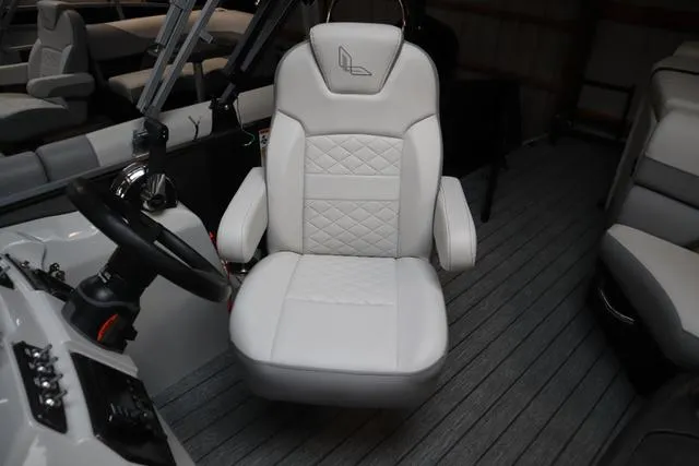 Slide: The Image of Captain's chair in 2023 Lowe SS 210 Triple Tube Package boat. - 7