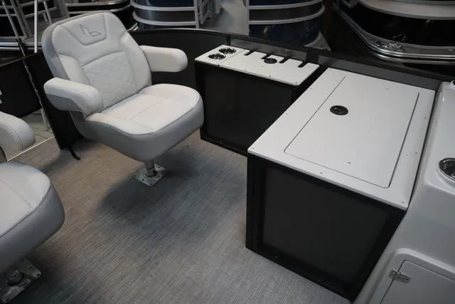 Slide: The Image of 2025 Lowe SF 212 WT boat interior with comfortable seating and storage compartments. - 3