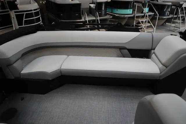 Slide: The Image of 2025 Lowe SF 212 WT boat interior with sleek, modern seating design. - 4
