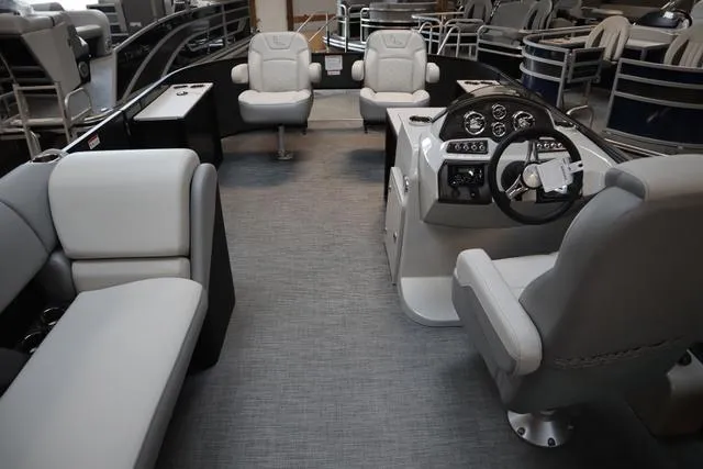 Slide: The Image of 2025 Lowe SF 212 WT pontoon boat interior with modern seating and control panel. - 5