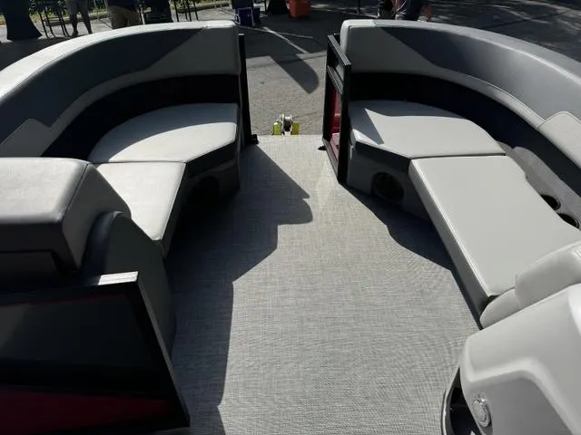 Slide: The Image of Interior of 2025 Lowe LS 170 boat with gray seating and carpet flooring. - 7