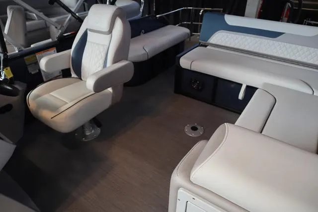 Slide: The Image of Storage compartment in 2025 Godfrey Sweetwater 2286 SFL Triple Tube Package boat interior. - 11