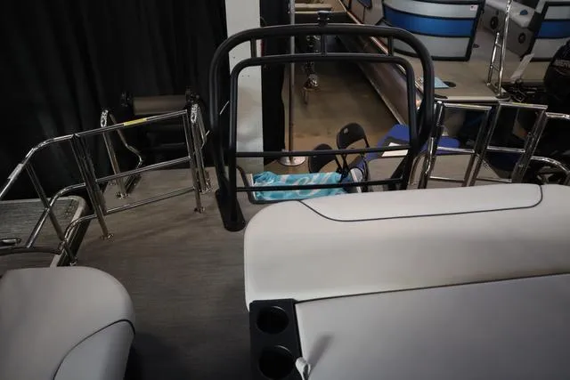 Slide: The Image of 2025 Godfrey Sweetwater 2286 SFL boat dashboard with steering wheel and instrument panel. - 16