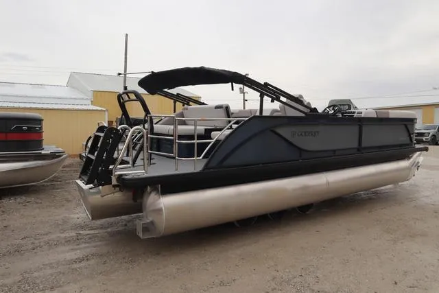 Slide: The Image of 2025 Godfrey Sweetwater 2286 SFL Triple Tube Package interior with beige seating and modern design. - 26