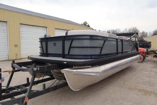 Slide: The Image of 2025 Godfrey Sweetwater 2286 SFL Triple Tube pontoon boat in a showroom. - 3