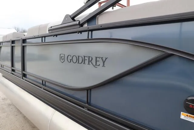 Slide: The Image of 2025 Godfrey Sweetwater 2286 SFL Triple Tube pontoon boat in showroom. - 4