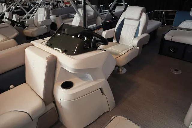 Slide: The Image of 2025 Godfrey Sweetwater 2286 SFL Triple Tube Package with spacious seating and modern interior design. - 8