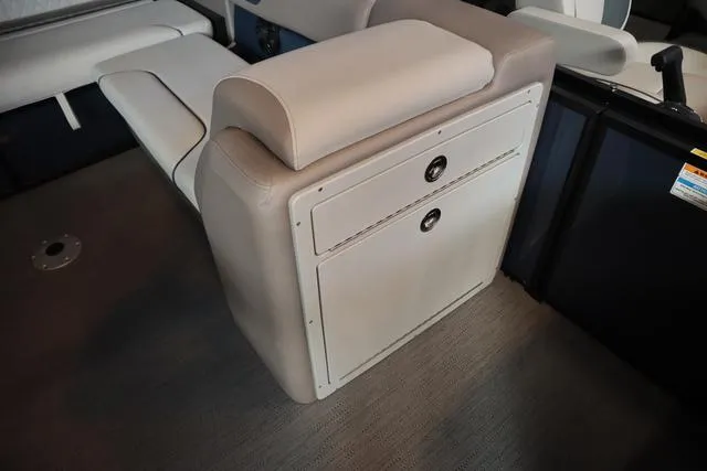 Slide: The Image of 2025 Godfrey Sweetwater 2286 SFL Triple Tube Package interior with luxurious seating and modern design. - 9