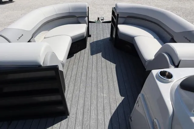 Slide: The Image of 2025 Lowe SS 230 WV boat interior with gray seating and flooring. - 7