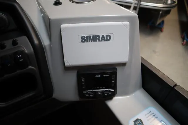 Slide: The Image of 2025 Bentley Pontoons Legacy 243 dashboard with Simrad navigation system. - 20