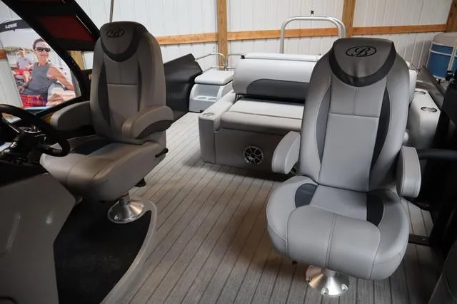 Slide: The Image of 2025 Bentley Pontoons Legacy 243 interior with gray seating and modern design. - 26