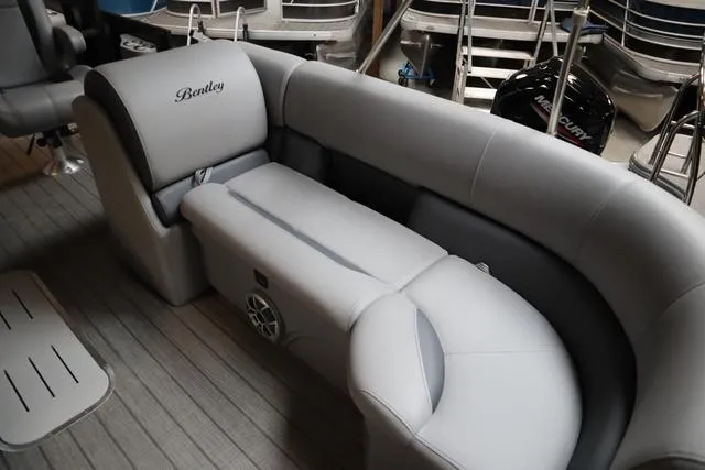 Slide: The Image of 2025 Bentley Pontoons Legacy 243 Swingback interior with luxurious seating and modern design. - 29