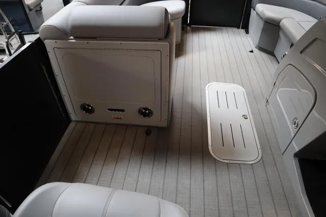 Slide: The Image of Interior of 2025 Bentley Pontoons Legacy 243, featuring sleek seating and modern flooring. - 33