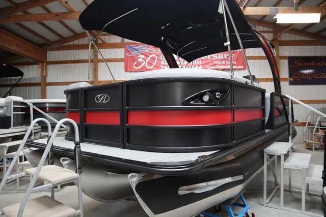 Slide: The Image of 2025 Bentley Pontoons Legacy 243 Swingback Ext. Triple Tube in showroom. - 4