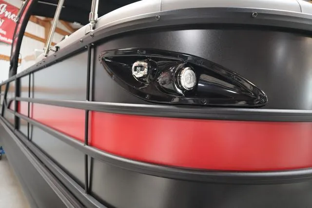Slide: The Image of 2025 Bentley Pontoons Legacy 243 Swingback with sleek black and red exterior design. - 45