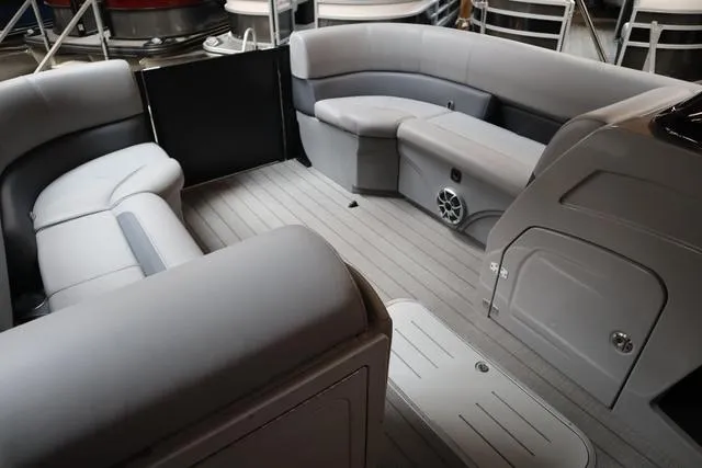 Slide: The Image of 2025 Bentley Pontoons Legacy 243 interior with gray seating and sleek design. - 6
