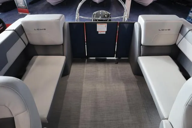 Slide: The Image of Interior of 2025 Lowe LS 230 WT Triple Tube pontoon boat with gray seating. - 7