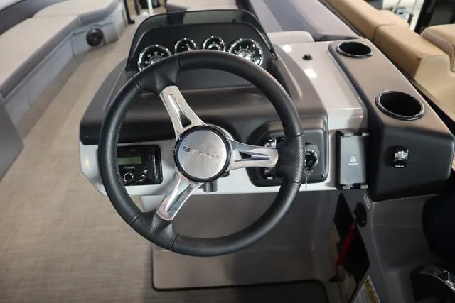 Slide: The Image of Steering wheel of 2025 Lowe LS 230 WT Triple Tube Package boat. - 8