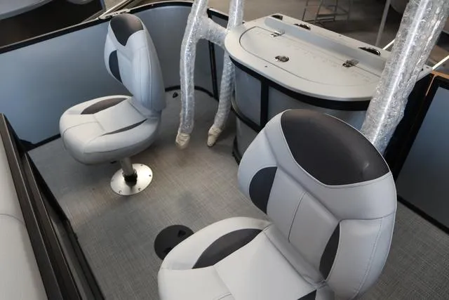 Slide: The Image of 2024 Bentley Pontoons Fish 200 4-Point interior with swivel seats and fishing station. - 10