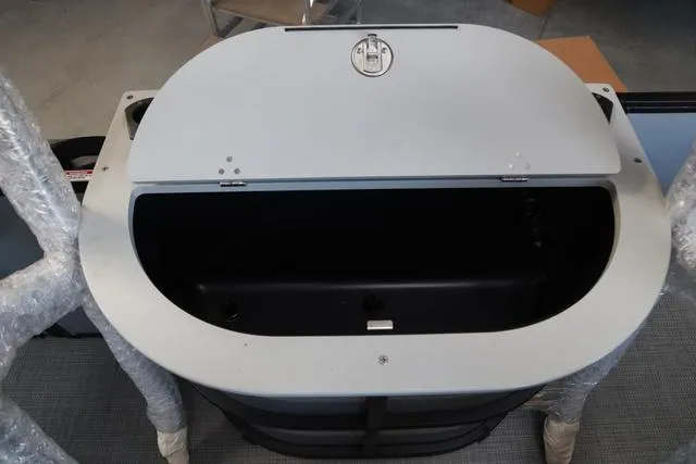 Slide: The Image of 2024 Bentley Pontoons Fish 200 4-Point livewell compartment, open view. - 12