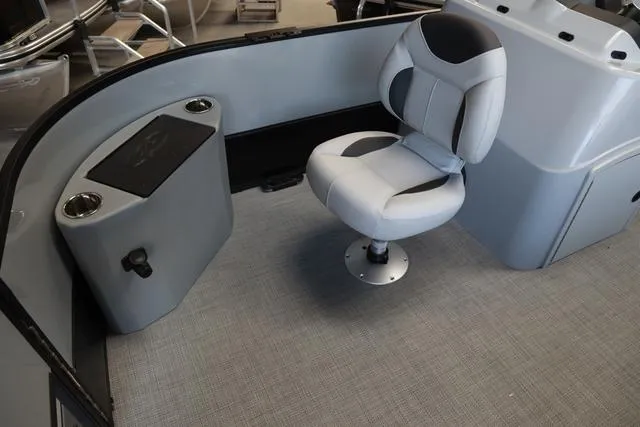 Slide: The Image of 2024 Bentley Pontoons Fish 200 4-Point interior with swivel seat and storage compartment. - 17