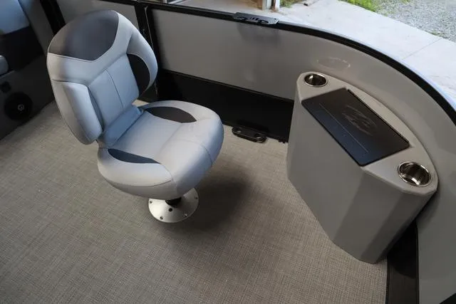 Slide: The Image of 2024 Bentley Pontoons Fish 200 4-Point interior with swivel seat and storage compartment. - 18