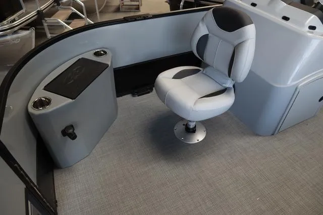 Slide: The Image of 2024 Bentley Pontoons Fish 200 4-Point interior with swivel seat and storage compartment. - 19